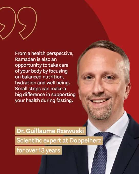 A professional man with short hair, smiling against a red background, shares advice on maintaining health during Ramadan through balanced nutrition and hydration. He emphasizes the importance of small steps for supporting health during fasting. He is identified as Dr. Guillaume Rzewski, a scientific expert at Doppelherz.